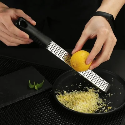 kf-S5153945f57164e89a3339364a48fecf3q Stainless Steel Manual Grater Sharp Kitchen Tool for Cheese Lemon Vegetable Potato with Non Slip Handle